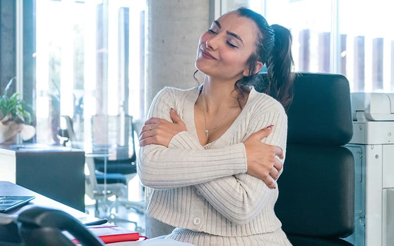 Desk worker doing neck stretches
